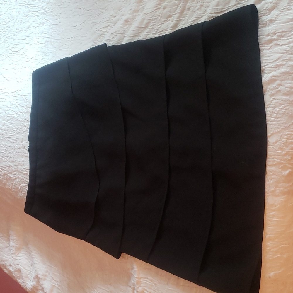 Knee length black skirt